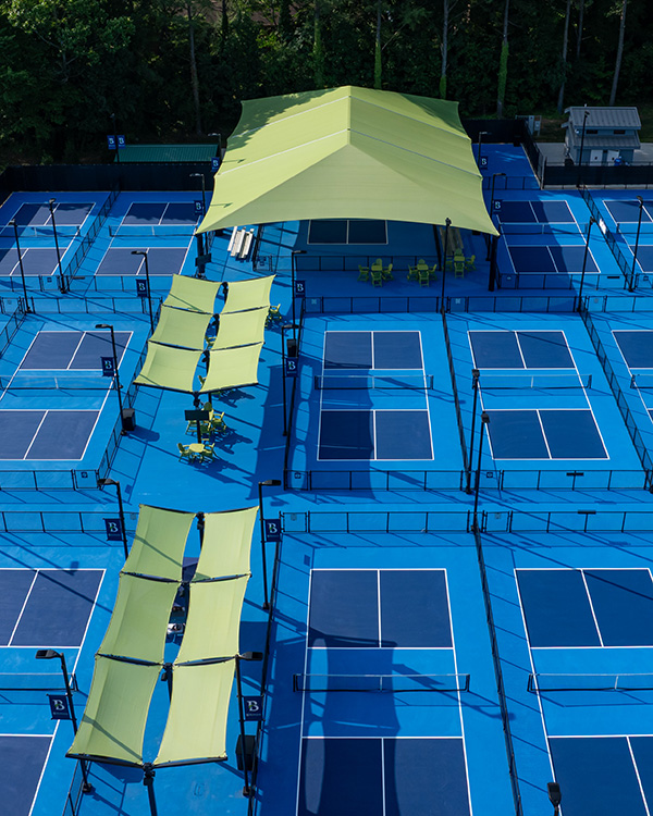 Superior Recreational Products shade structures over multiple pickleball courts at Fairchild Pickleball Complex in Burlington, NC.
