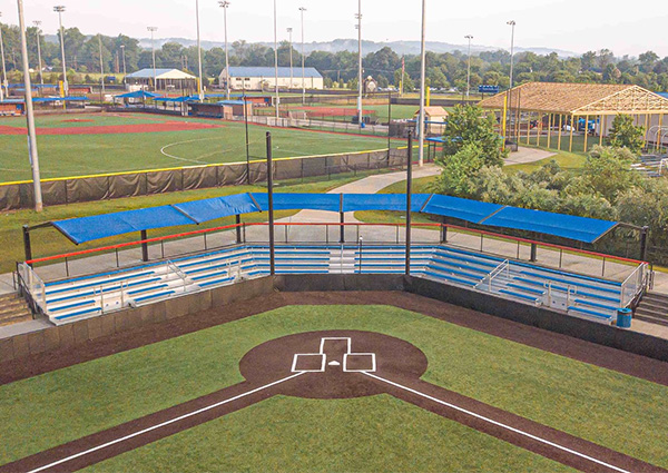 SR Carolinas baseball field bleachers with shade covers at sports complex in The Carolinas