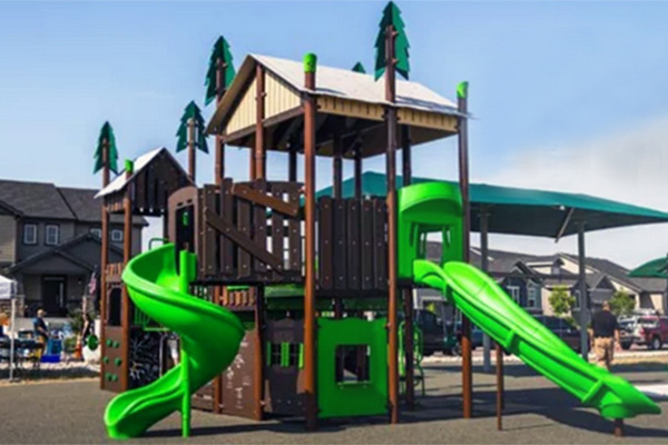 Green and brown themed playground with spiral and straight slides by Superior Recreation of the Carolinas.
